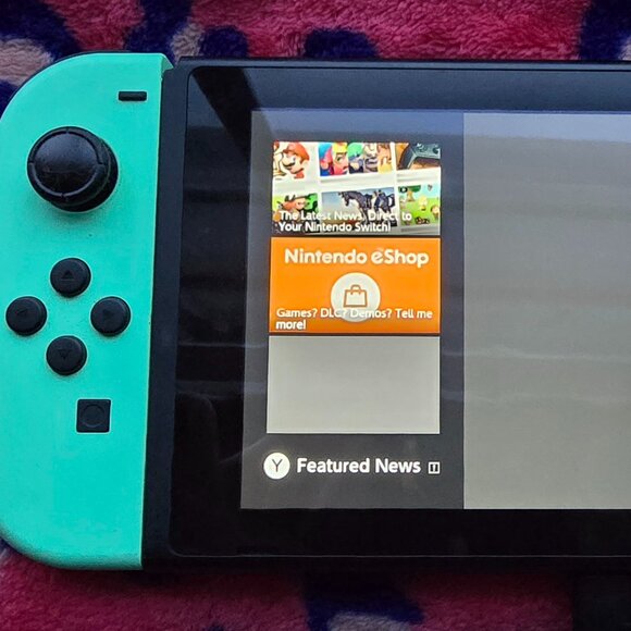 Nintendo Switch (Animal Crossing Version) - Picture 1 of 4